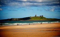 Dunstanburgh Castle ruins from Embleton Bay, Northumberland