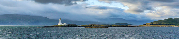 Panorama of Eilean Musdile Lighthouse, Lismore, in early evening light